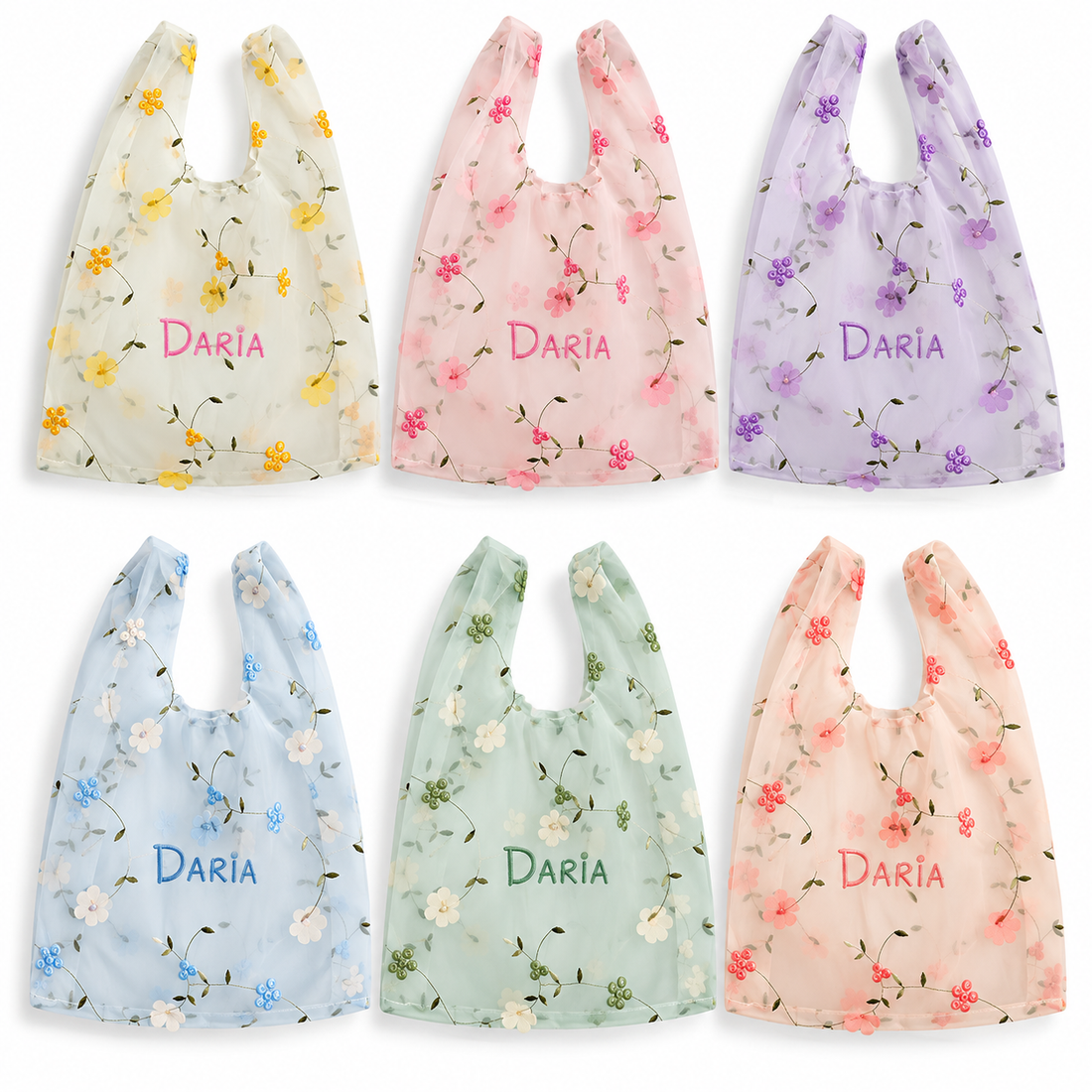 Floral baby bib colorways with embroidered Daria names