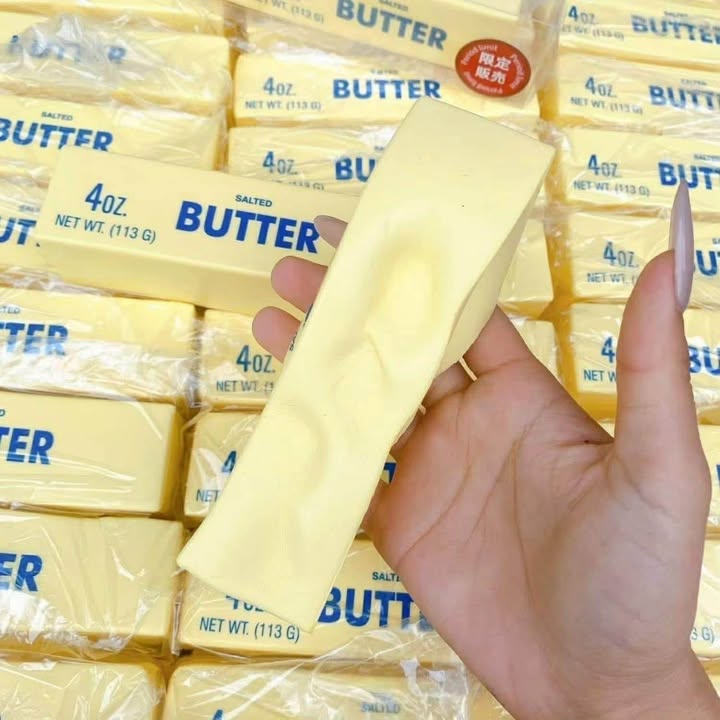 Giocattolo a bastoncino di burro da spremere