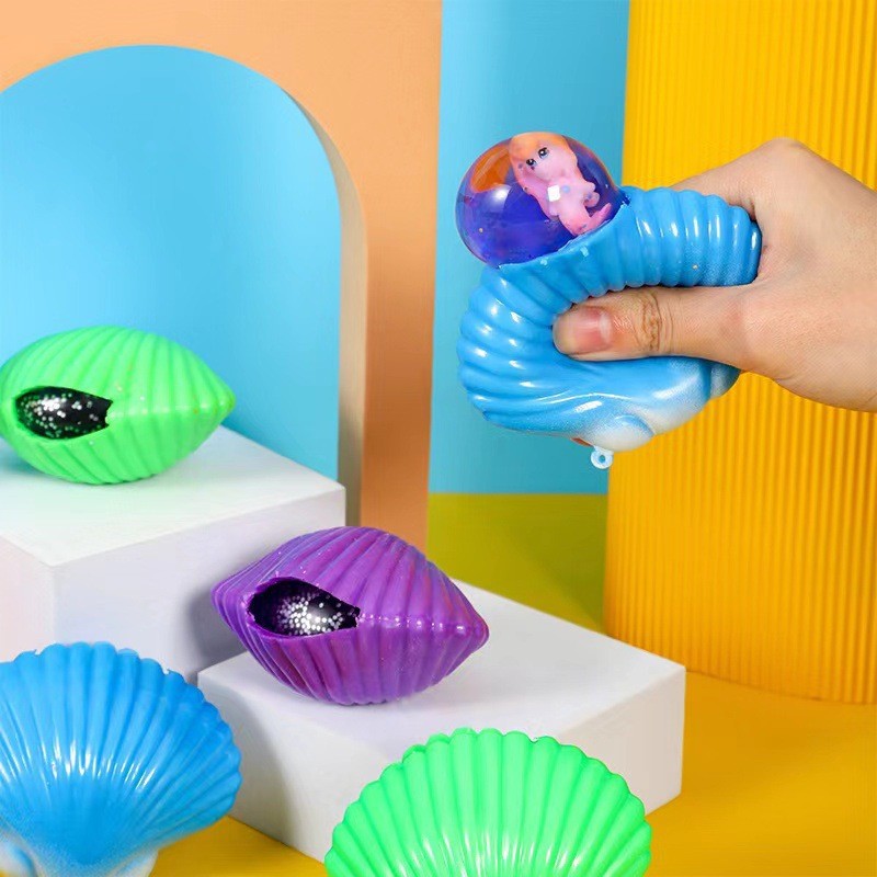 Giocattolo squishy a conchiglia