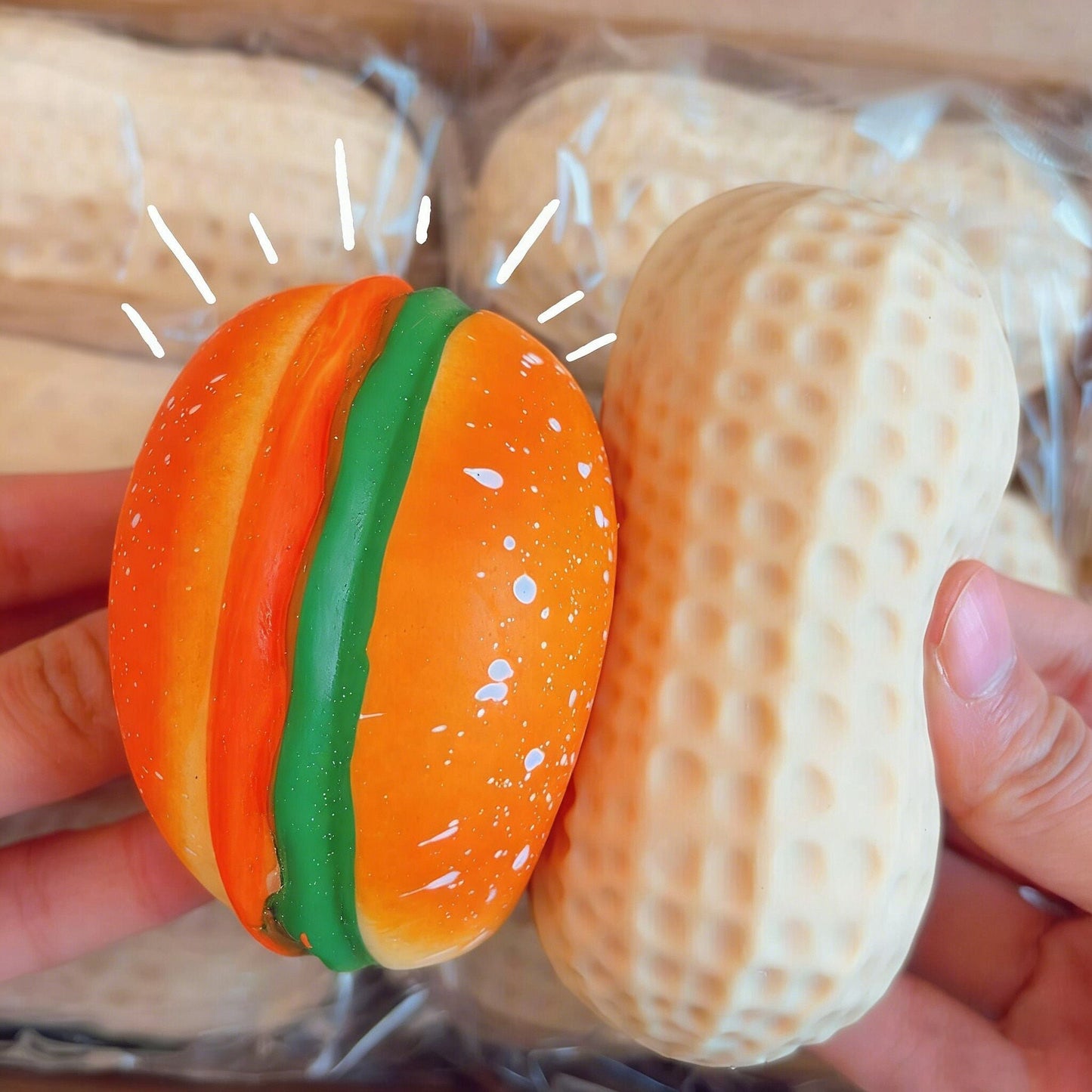 Giocattoli squittenti: arachidi, hamburger, pannocchia